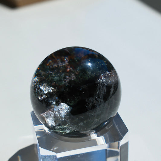 Green Phantom Quartz Sphere with Blue Mineral Inclusions