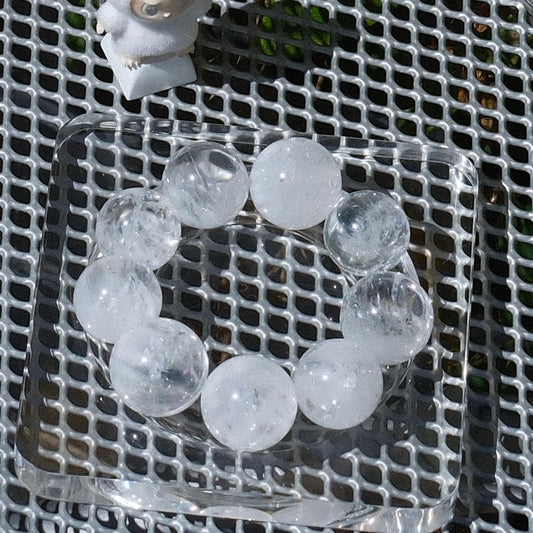 White Rutilated Quartz Bracelet with Clear Flower Inclusions